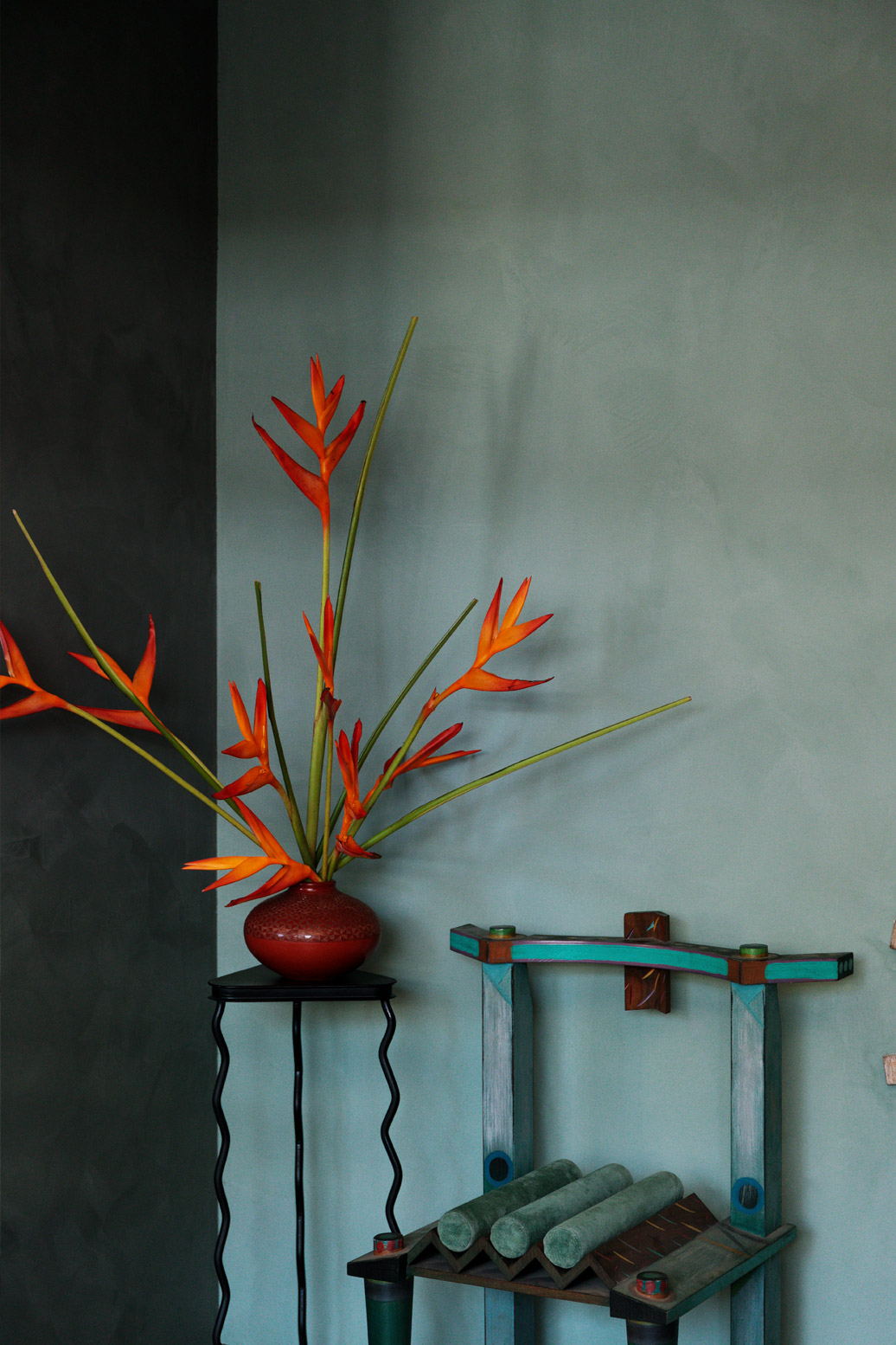 downtown la proper hotel suite with artfully designed chair and plant