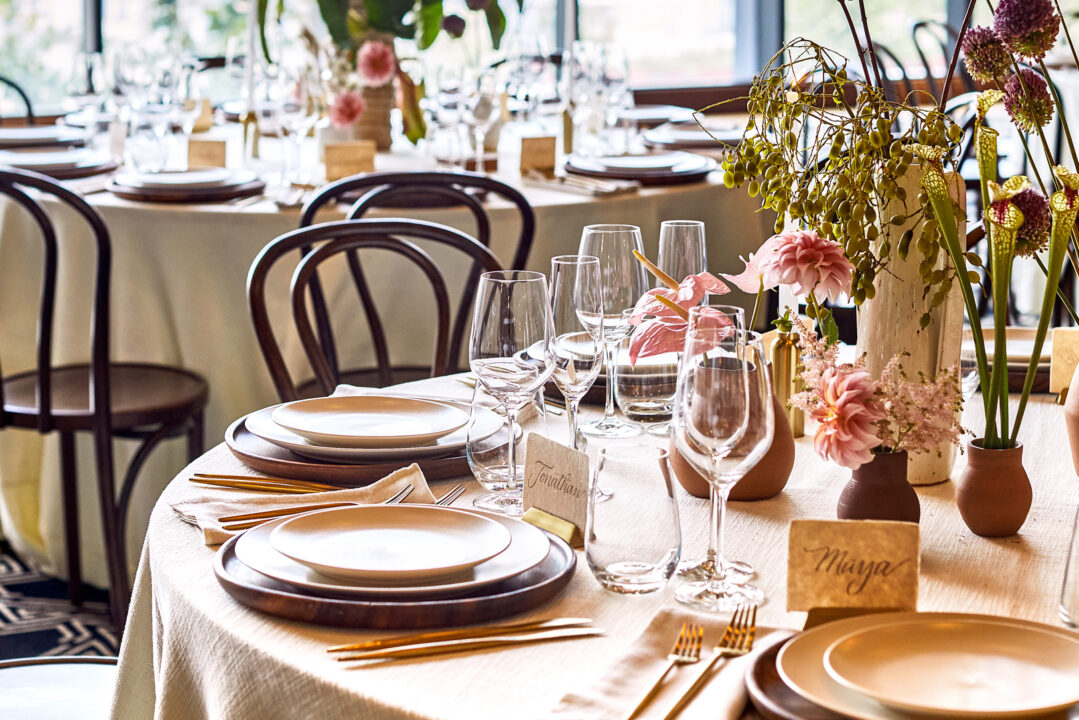 Elegant table setting with floral centerpiece and glassware