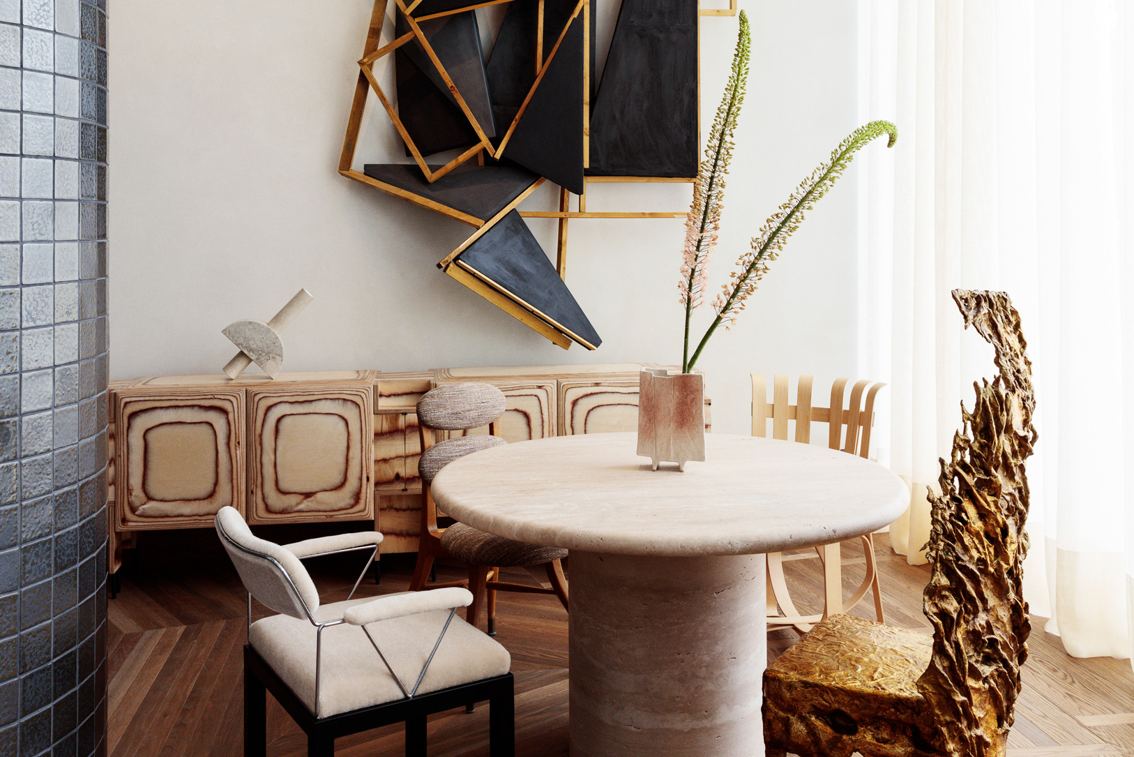 Modern lounge with sculptural furniture and curated art pieces