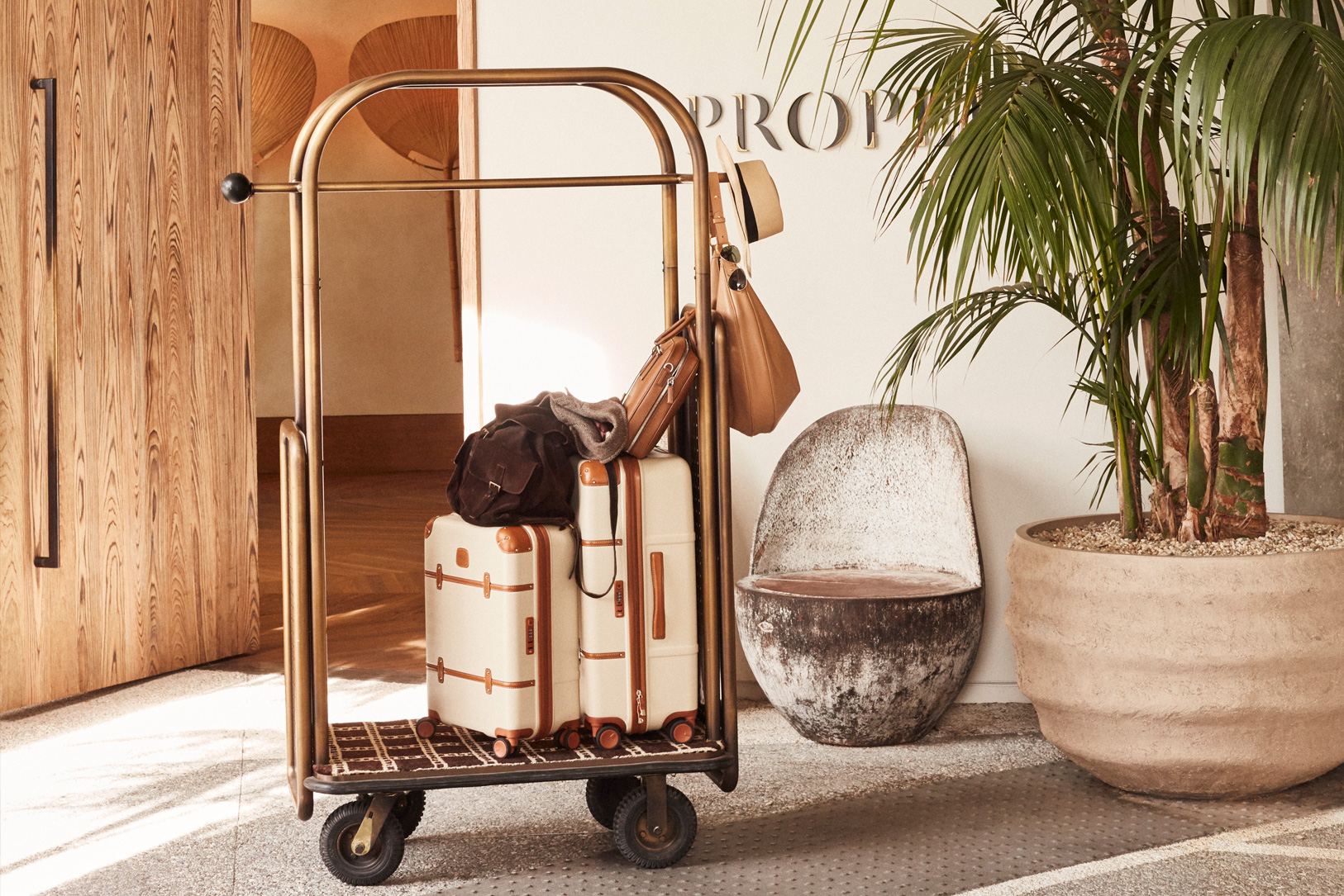 Luxury luggage cart in stylish hotel lobby entrance