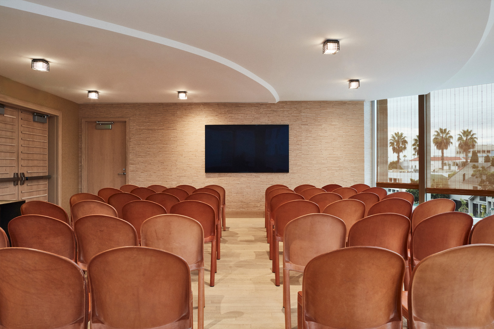Converge meeting room with movie theater seating set up