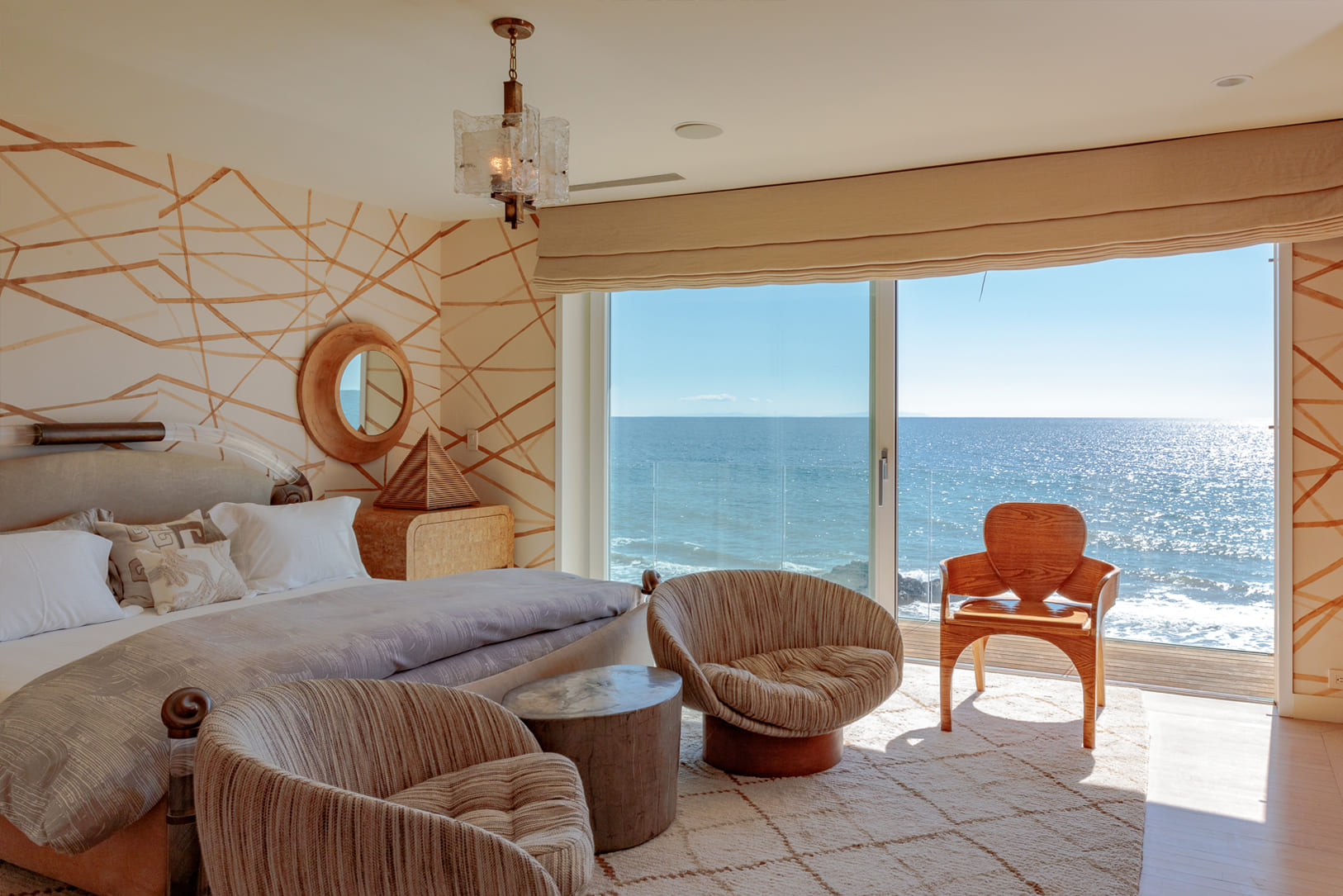 Ocean front bedroom with kelly wearstler custom decor