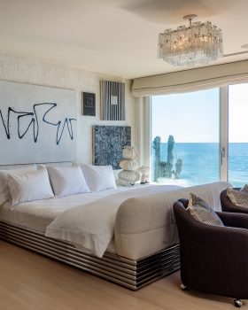 Malibu Beach House master bedroom with ocean front balcony and kelly wearstler custom decor
