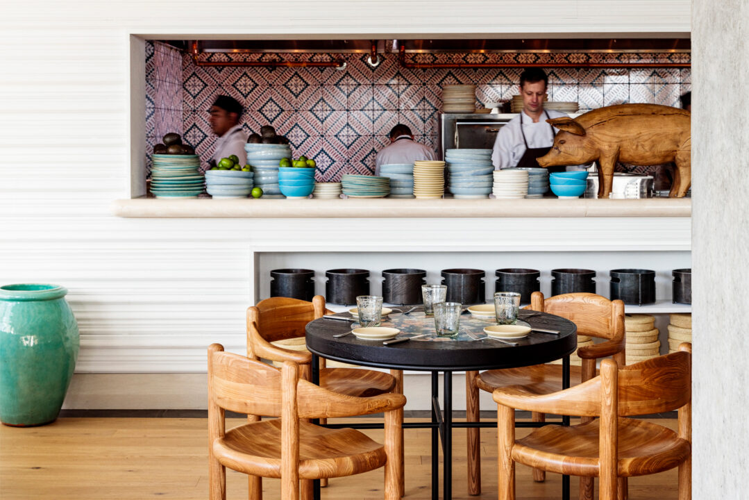 La Piscina table seating with view of chefs kitchen