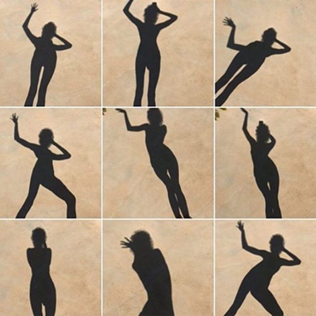 Shadow of woman in various poses arranged in a mosaic pattern