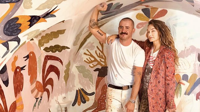 Abel Macias and Kelly Wearstler together in front of his downtown la proper mural