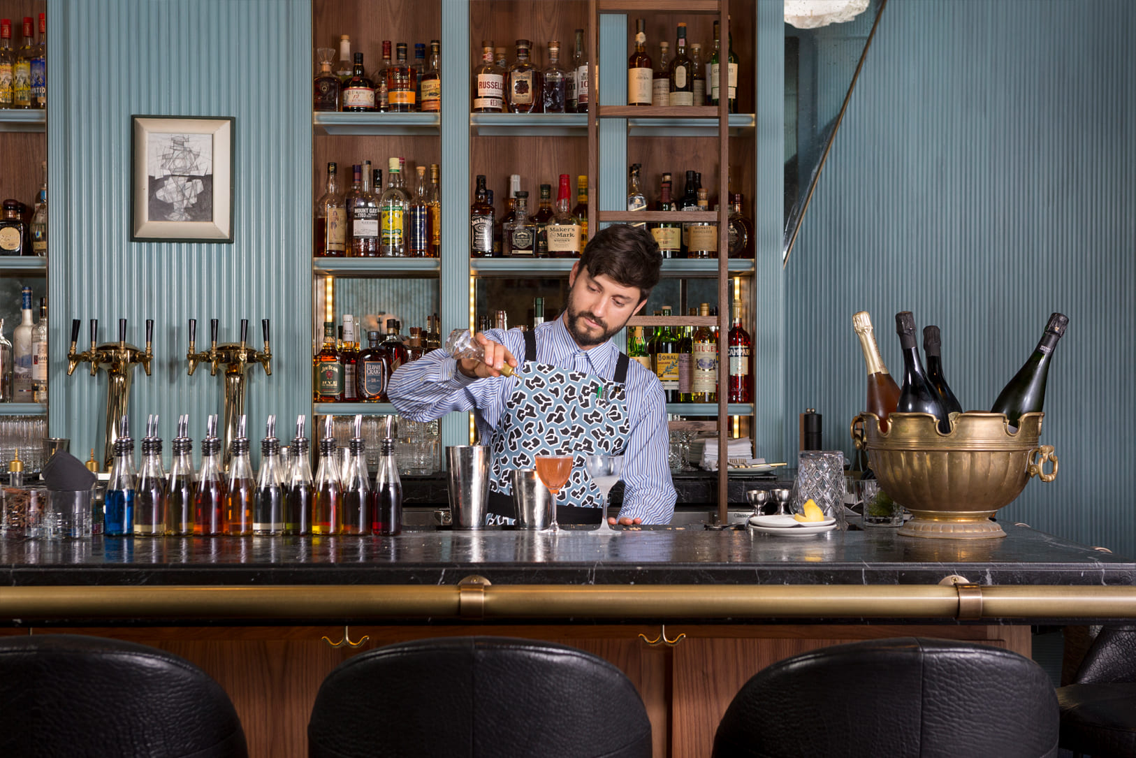 bartender at Villon San Francisco pouring cocktails