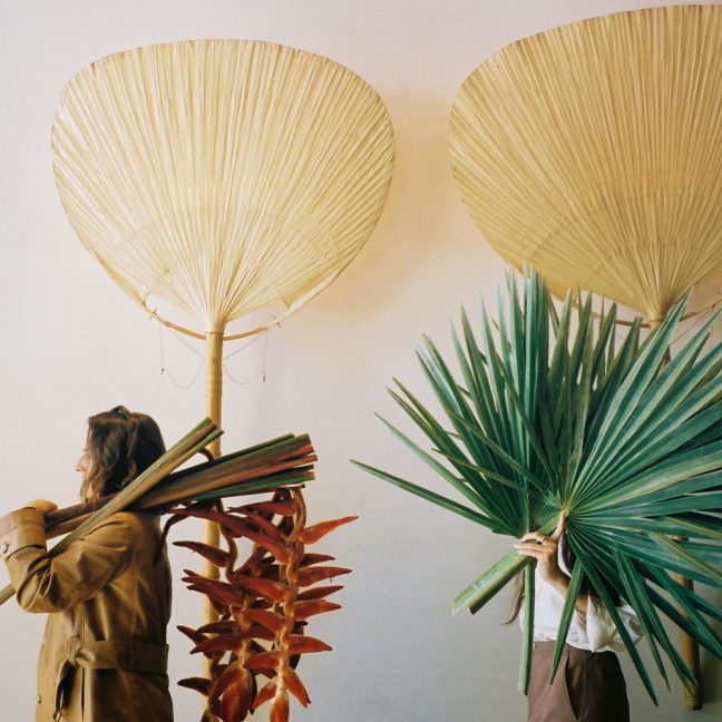 Floral Artist Sophia Moreno-Bunge carrying materials