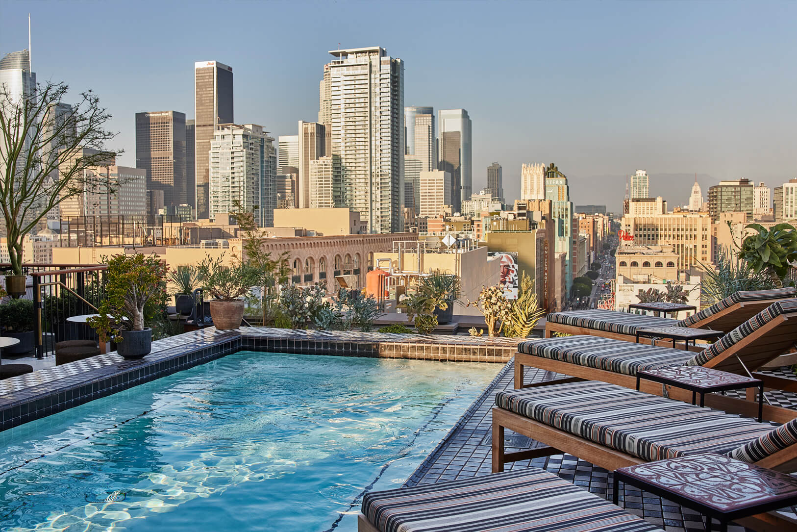 Downtown LA Proper Rooftop pool with view of city skyline