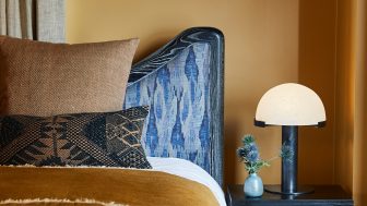 up close image of king bed in Pool Suite