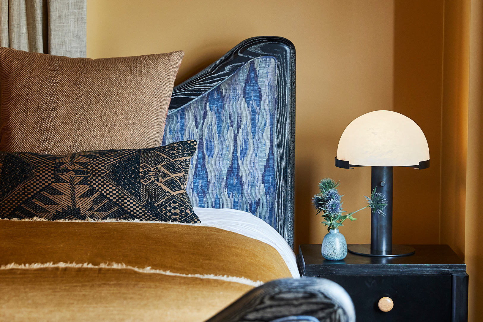 up close image of king bed in Pool Suite