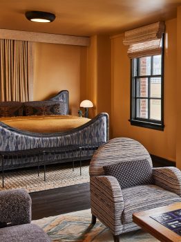 Pool suite king bedroom with seating area