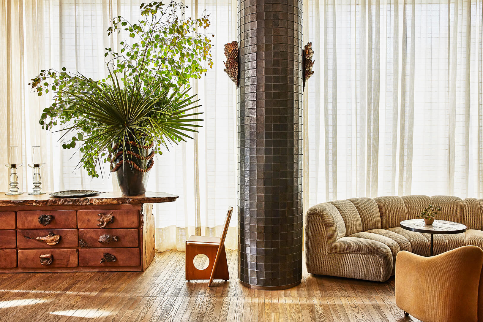 Luxury lounge with warm wood tones and natural light