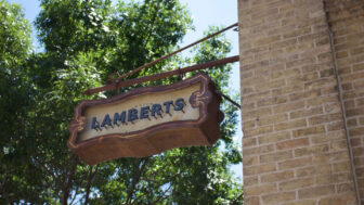 A signboard mounted on the wall displays the name LAMBERTS prominently