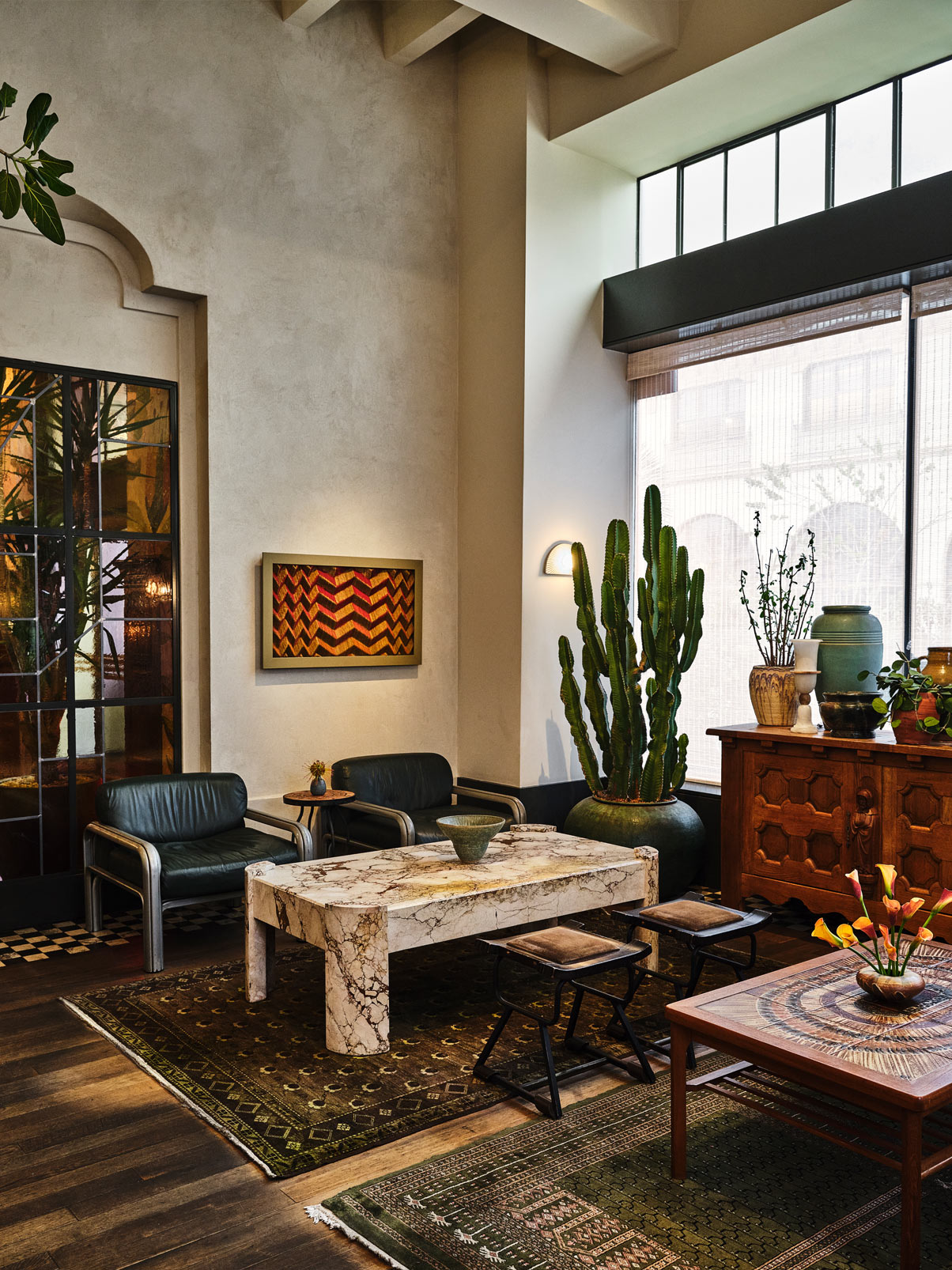 Caldo Verde Sophisticated lounge with marble table and desert inspired decor