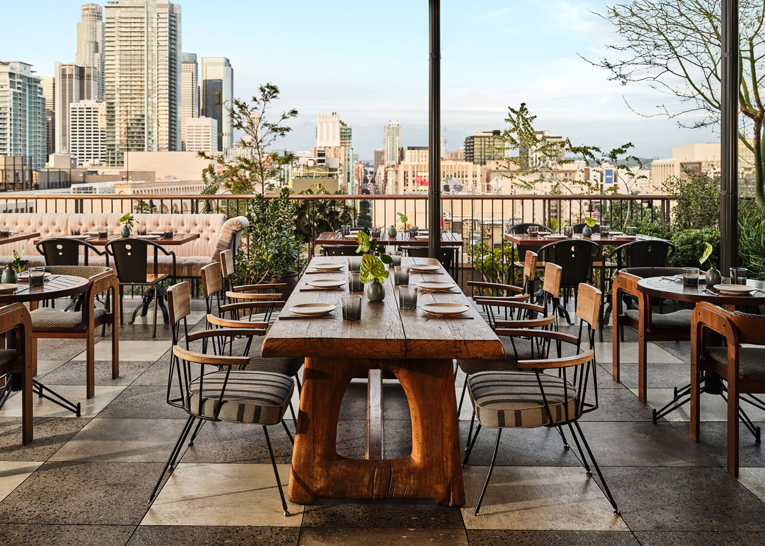 Cara Cara Rooftop dining terrace with downtown skyline views