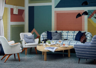A well-arranged sofa set with a uniquely designed coffee table.