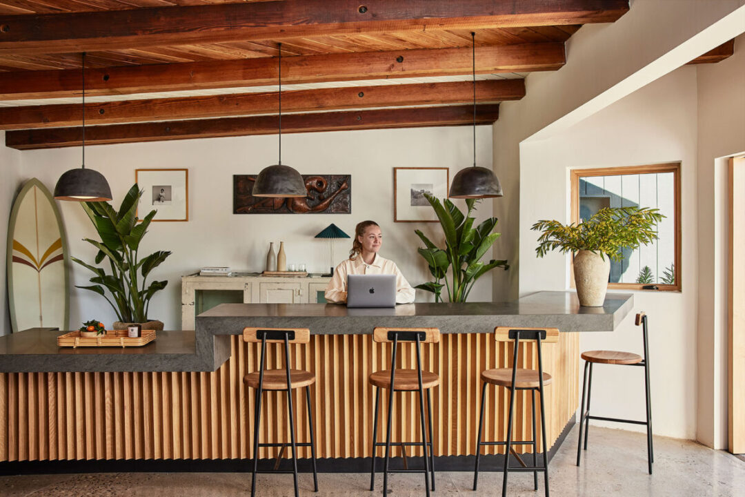 Warm, modern reception space with wood accents and a relaxed, coastal vibe.