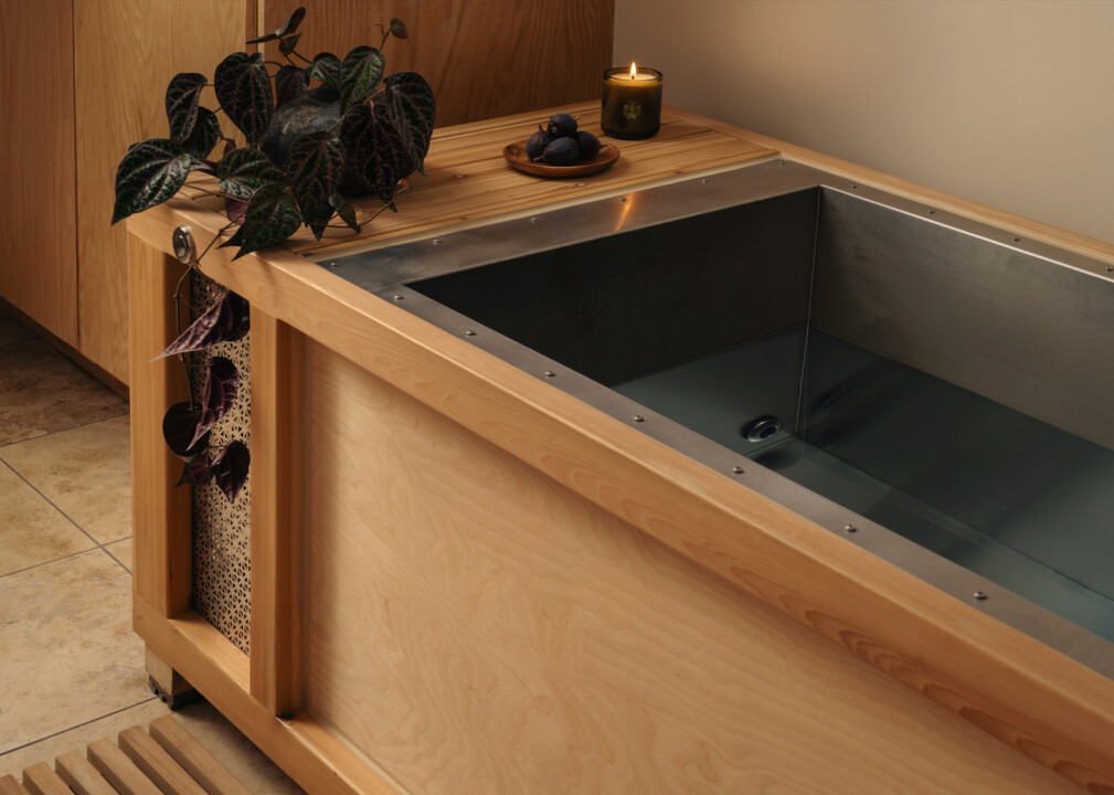Wooden cold plunge tub with a minimalist spa setup