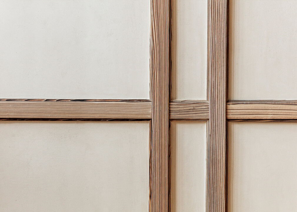 Minimal wood panel detailing with clean, textured lines for Austin property