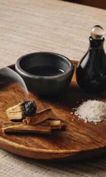 Wooden tray with incense, salt, and spa essentials
