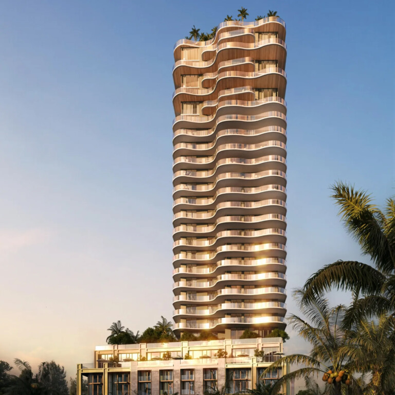Sleek high-rise with flowing, modern architectural design.