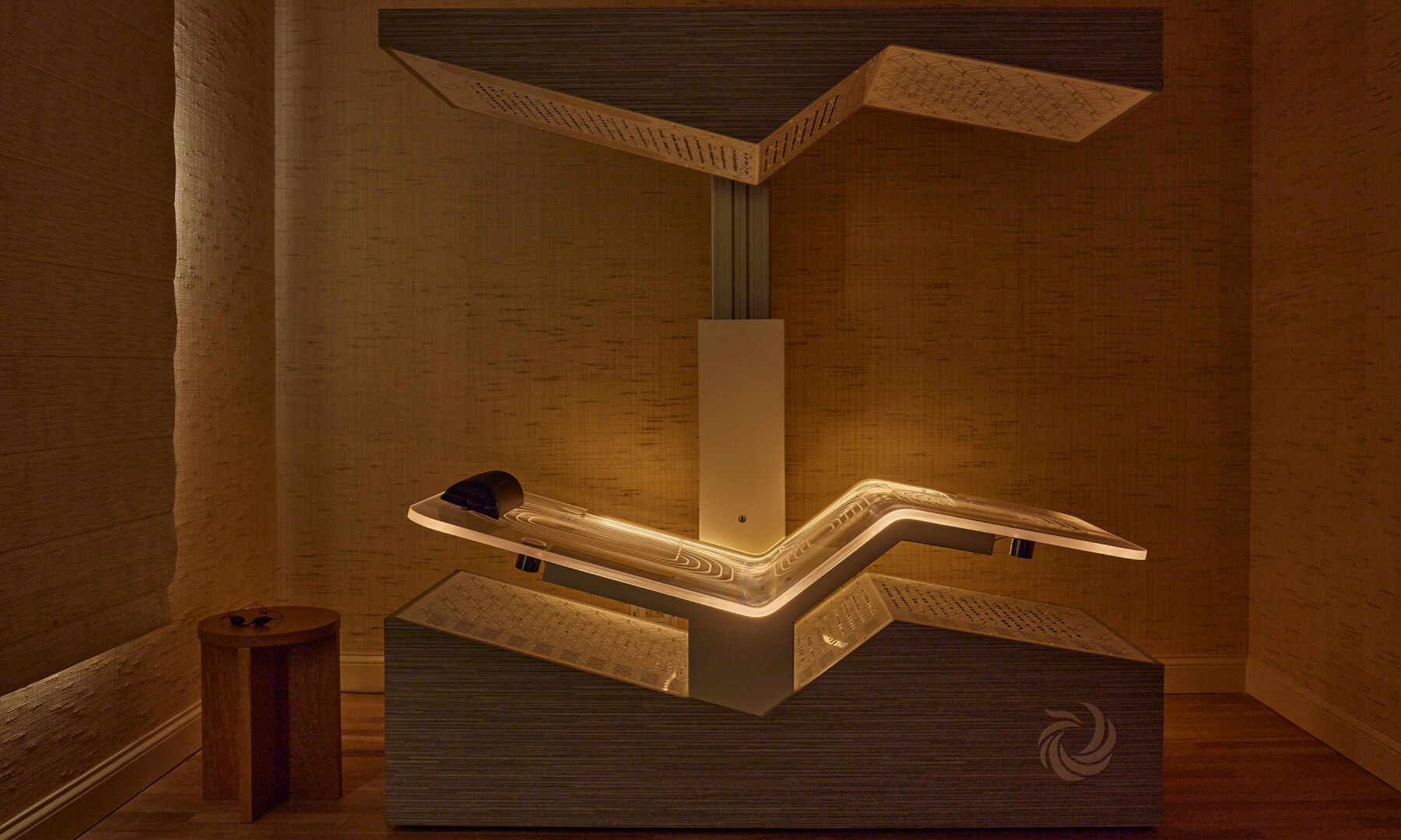 Luxury wellness treatment room with modern light therapy bed