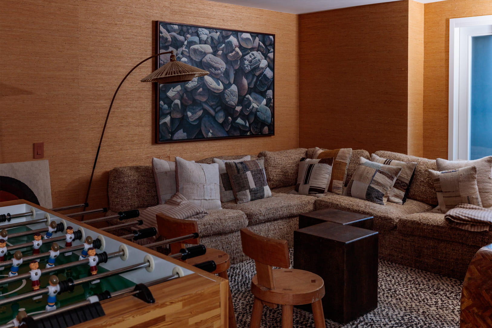 Malibu beach house game room with large L shaped couch