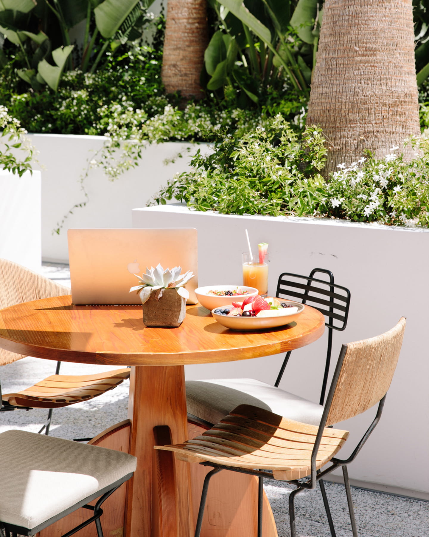 work set up at a table on olea terrace